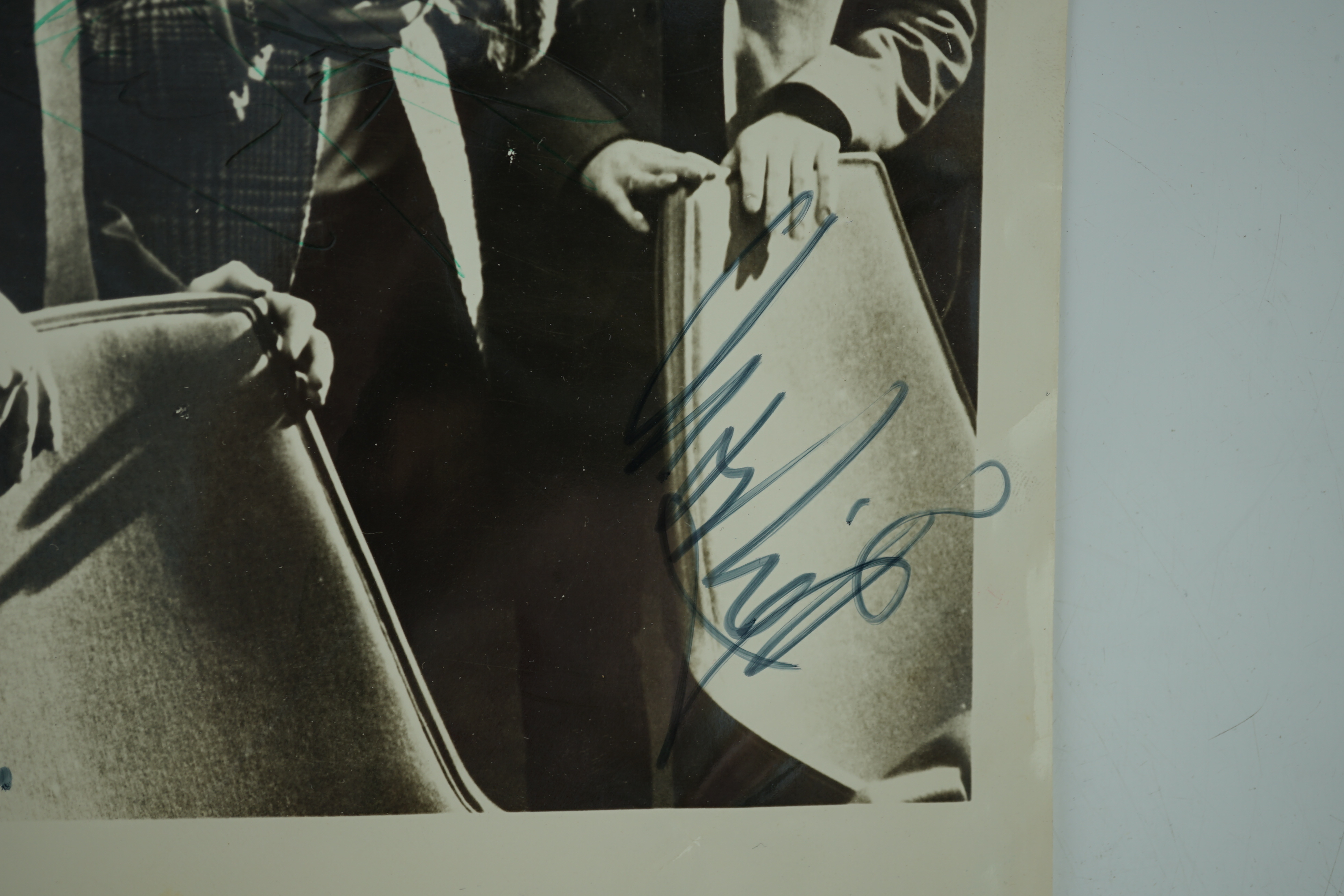 The Rolling Stones; a signed 1960s photograph including; Mick Jagger, Bill Wyman, Brian Jones, Keith Richards and Charlie Watts